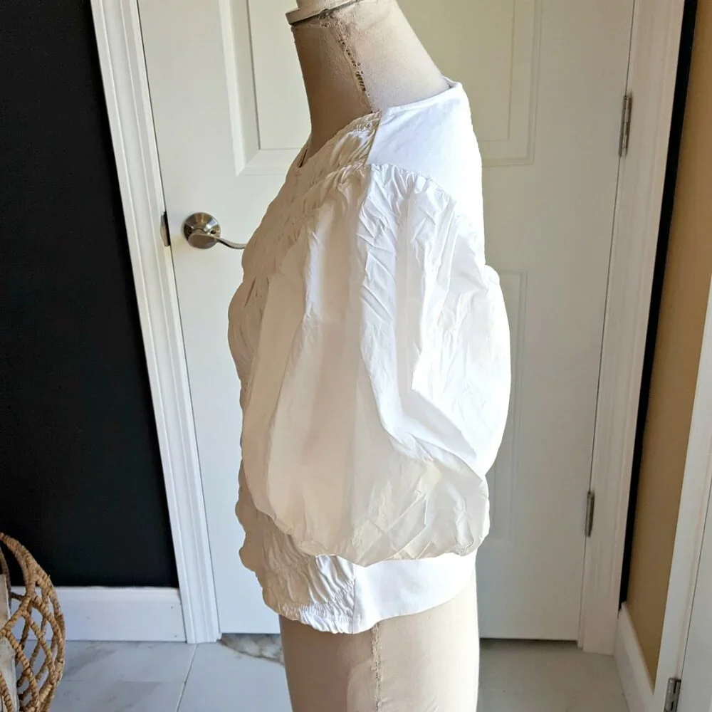 Anthropologie's PUFFY FRONT Puff SLEEVE BLOUSE